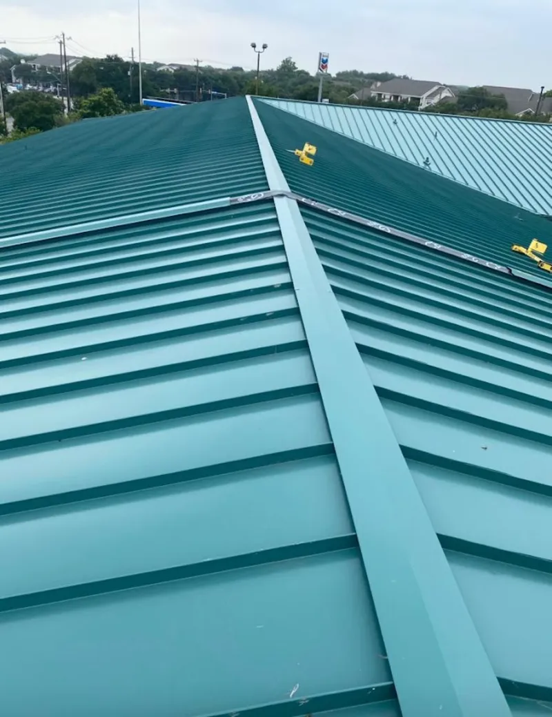 Green commercial metal roof ridge and valley for Metal Roof Repair in Tuskegee
